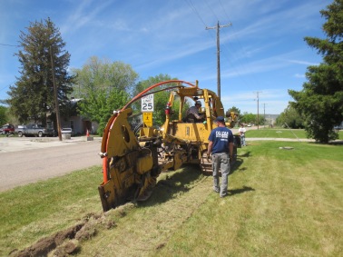 Plowing in conduit for fiber optic cable along Center street in Rockland