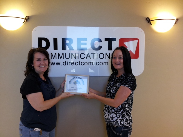 Rockwell High presents Direct Communications with a certificate of appreciation